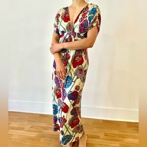 Beautiful boutique dress. Empire waist and lovely bright design.